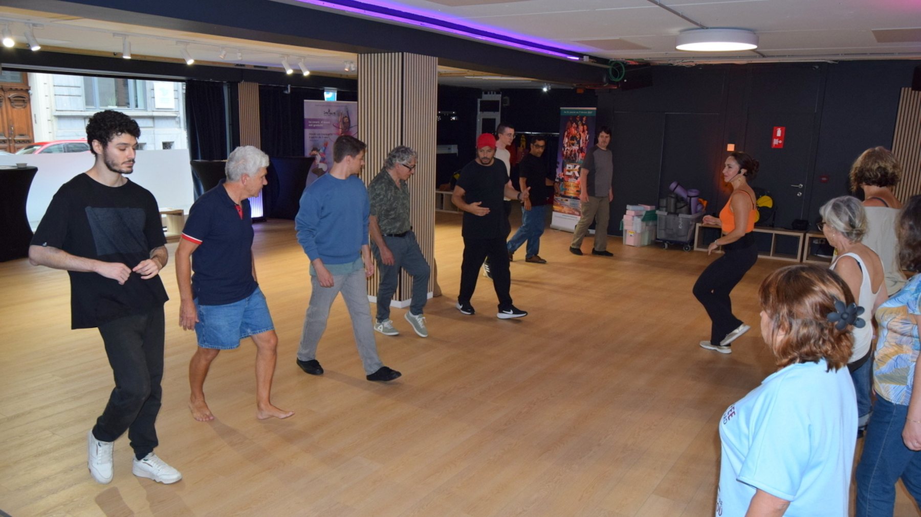 A latin dance class at Studio 28, the room full on the oak floor