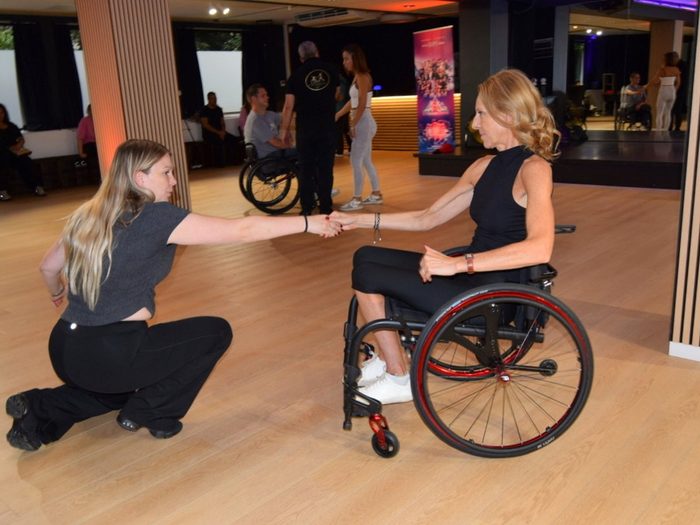 A cyclodance class: wheelchair dancing, in the studio